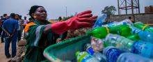 Image of woman and plastic sorting